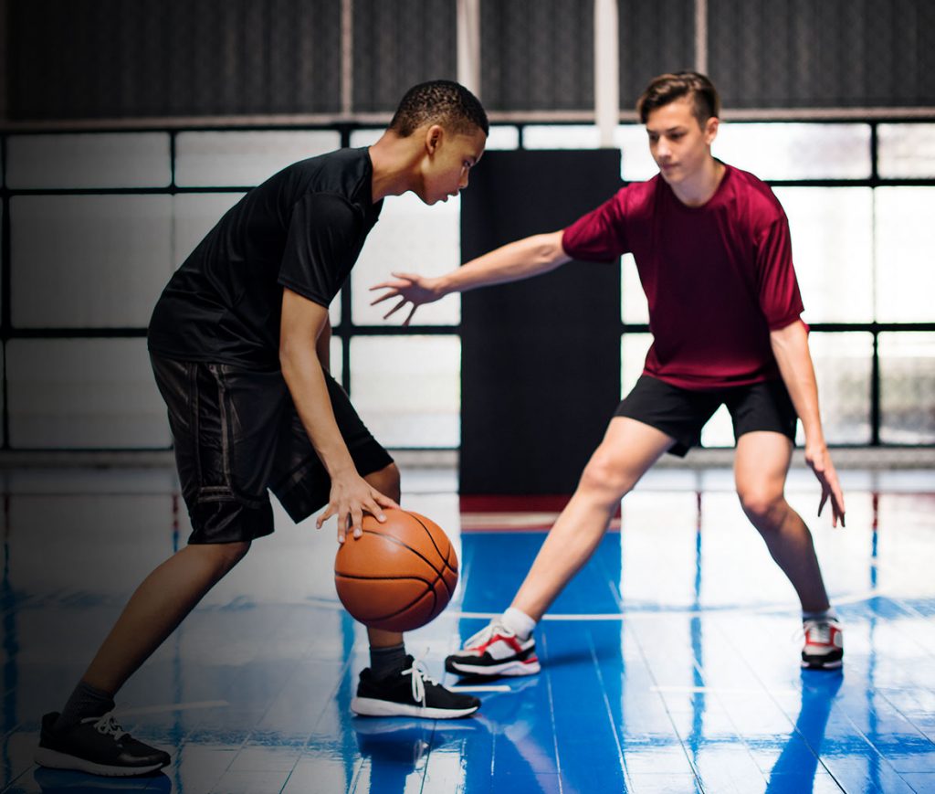 Two Kids Playing Basketball